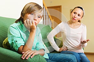 Mother berating teenager son