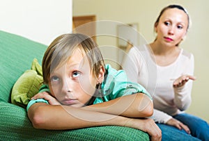 Mother berating teenager son