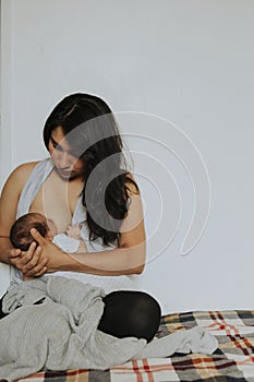 Mother breast feeding her baby