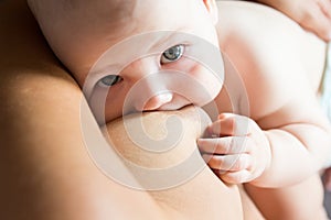 Mother breast feeding a newborn