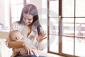 Mother breastfeeding her baby