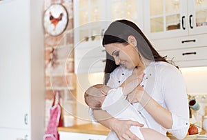 Mother breastfeeding her baby