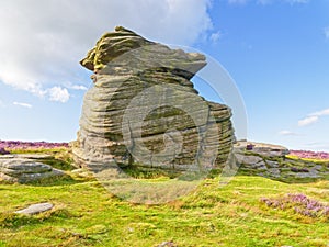 Mother Cap gritstone rock formation high in the Derbyshire Peak District.