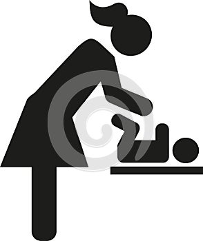 Mother changing nappy baby icon