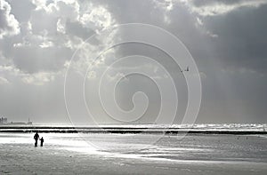 Mother and child at the beach photo