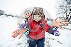 Mother with child boy son at winter