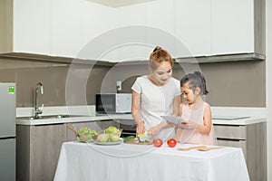 Mother and child and computer use, Invented a food menu