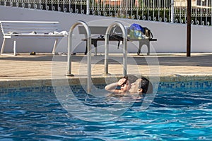 Mother and Child Enjoying Pool Time Together