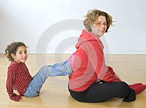 Mother and child exercising