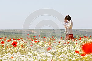 Mother and child in field