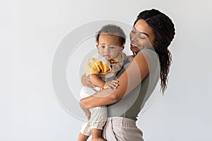 Mother And Child. Happy Young African American Mom Holding Cute Toddler Baby