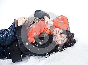 Mother and child playing in snow