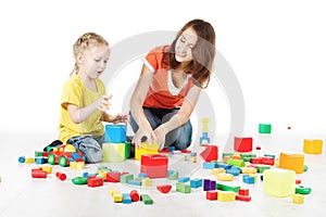 Mother and child playing toys blocks