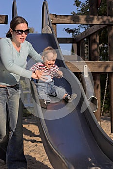 Mother with Child on Slide