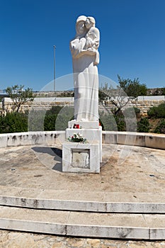 Mother and child statue in Croatia.