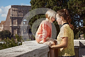 Mother and child tourists in Rome, Italy having fun time