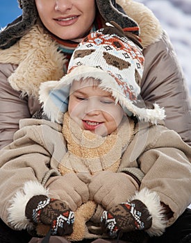 Mother and child at winter