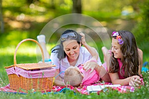 Mother with children enjoying at the picnic