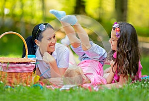 Mother with children enjoying at the picnic