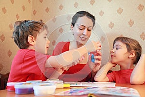 Mother and children model from plasticine photo