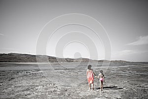 Mother and children walking