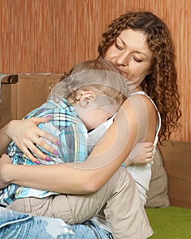 Mother comforting crying child