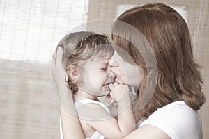 Mother Comforts Crying Baby Girl