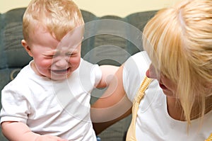 Mother with crying baby boy