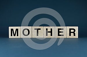 Mother. The cubes form the word Mother