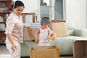 Mother and daugher packing