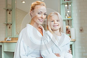 mother and daughter in bathrobes