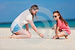 Mother and daughter at beach
