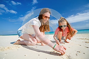 Mother and daughter at beach