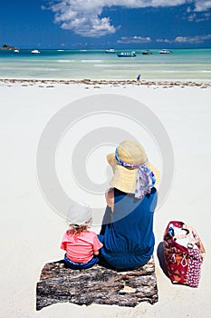 Mother and daughter on beach vacation