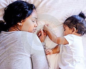 Mother daughter bed baby sleeping dreaming