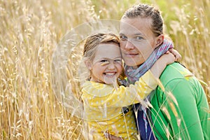 Mother and daughter bonding embrace