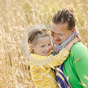 Mother and daughter bonding embrace