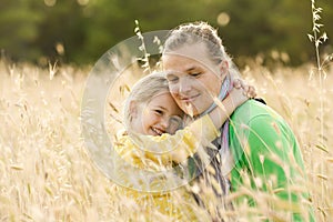 Mother and daughter bonding embrace