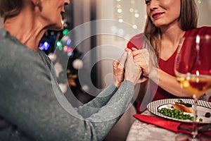 Mother and daughter bonding on family Christmas dinner