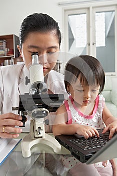 Mother and daughter busy on their own