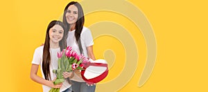 Mother and daughter child banner, copy space, isolated background. happy mothers and womens day. spring flower bouquet