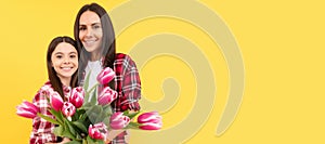 Mother and daughter child banner, copy space, isolated background. happy mothers and womens day. spring flower bouquet