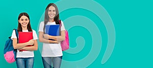 Mother and daughter child banner, copy space, isolated background. private teacher and child holding copybooks. family