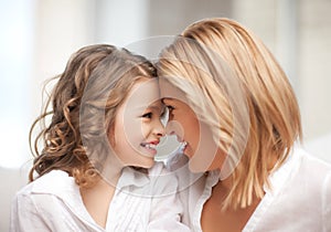 Mother and daughter cuddling