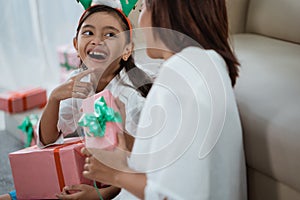 Mother and daughter gift exchange