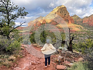 A mother and daughter going for a hike on a winter day in Sedona, Arizona, USA