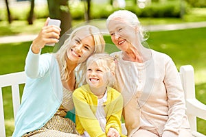 Mother with daughter and grandmother at park