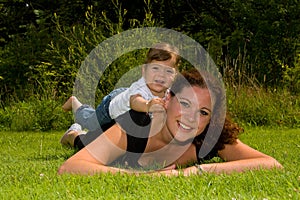 Mother and daughter in the grass