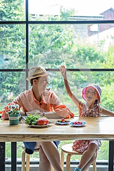 Mother with Daughter Having Fun on Open Kitchen