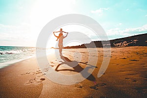 Mother and daughter having fun on tropical beach - Mum playing with her kid in holiday vacation - Family lifestyle and love